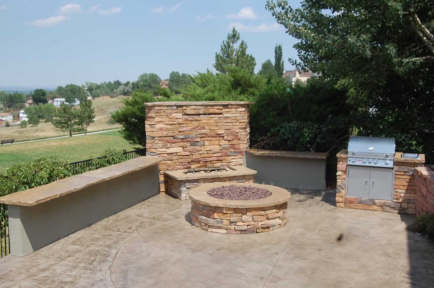 Stamped concrete patio and landscaping installation by FRSR in Colorado