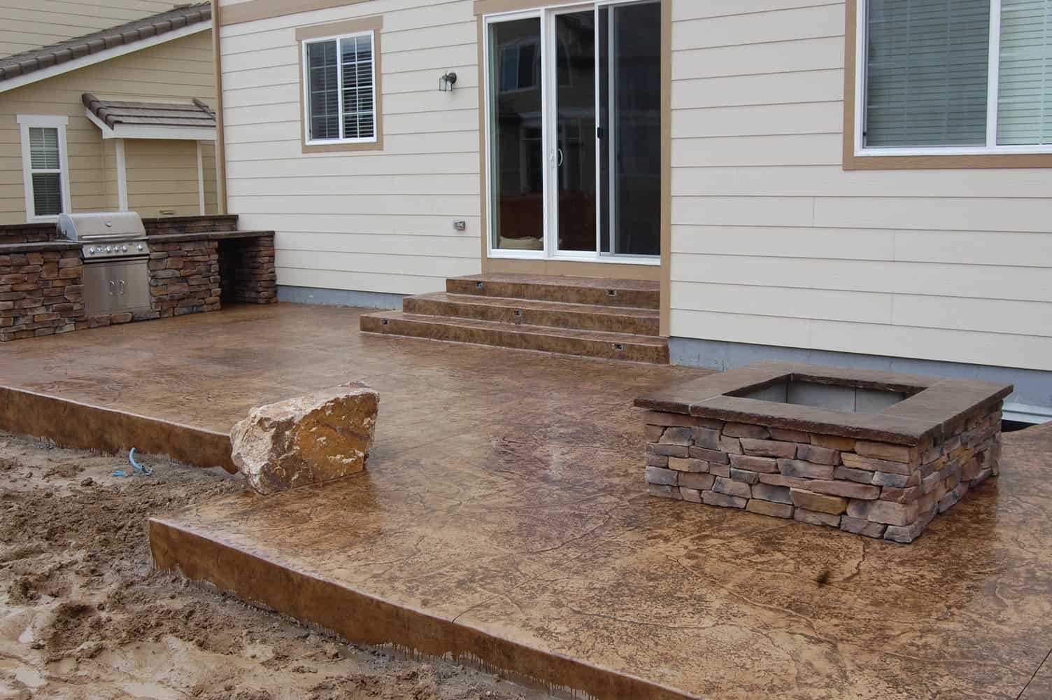 Roman Slate Texture stamped concrete patio example by FRSR in Castle Rock, CO