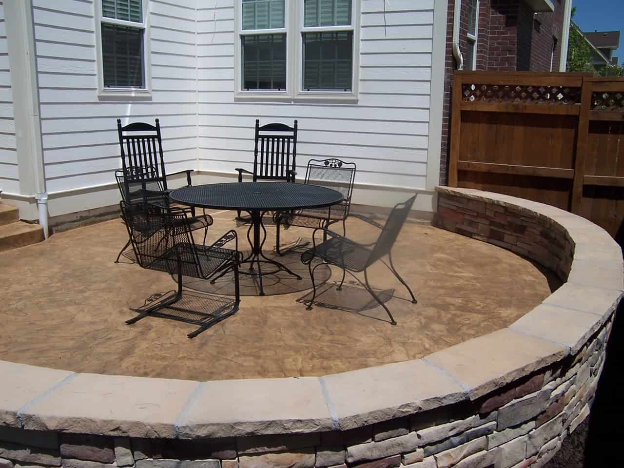 Stone fire pit and seat wall built by FRSR