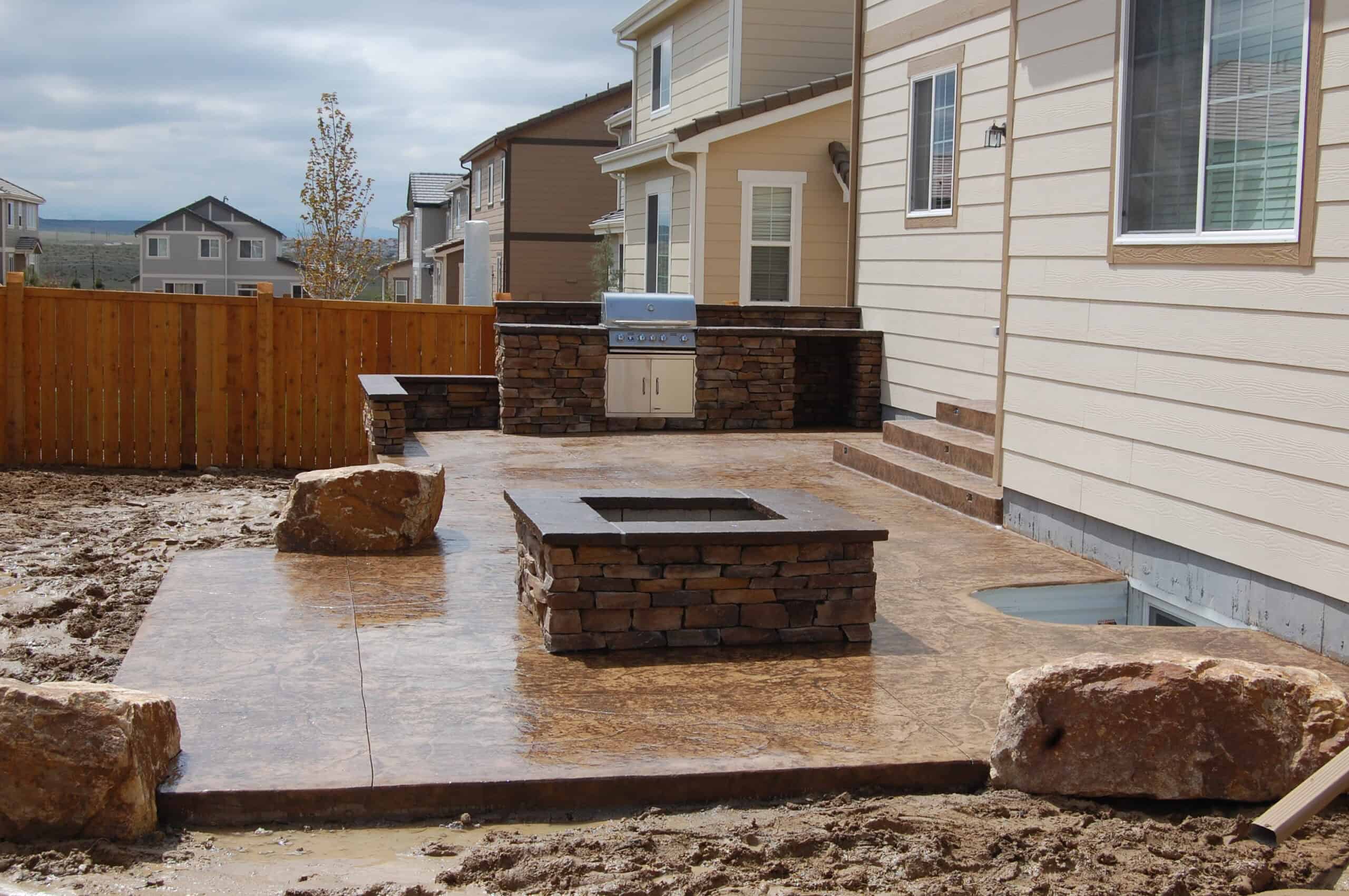 Rzesztbuek Project in Parker Colorado by FRSR with backyard landscaping retaining walls and artificial turf