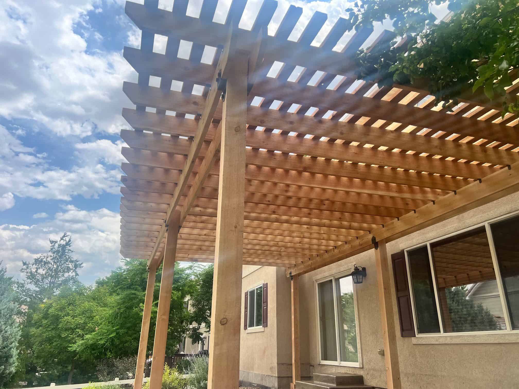 Pergola and roof cover over patio built by FRSR in Colorado