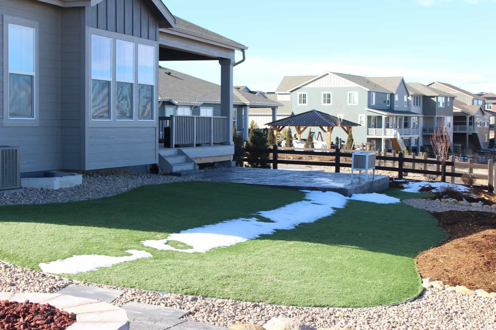 Backyard view showing turf and yard layout in Castle Rock project