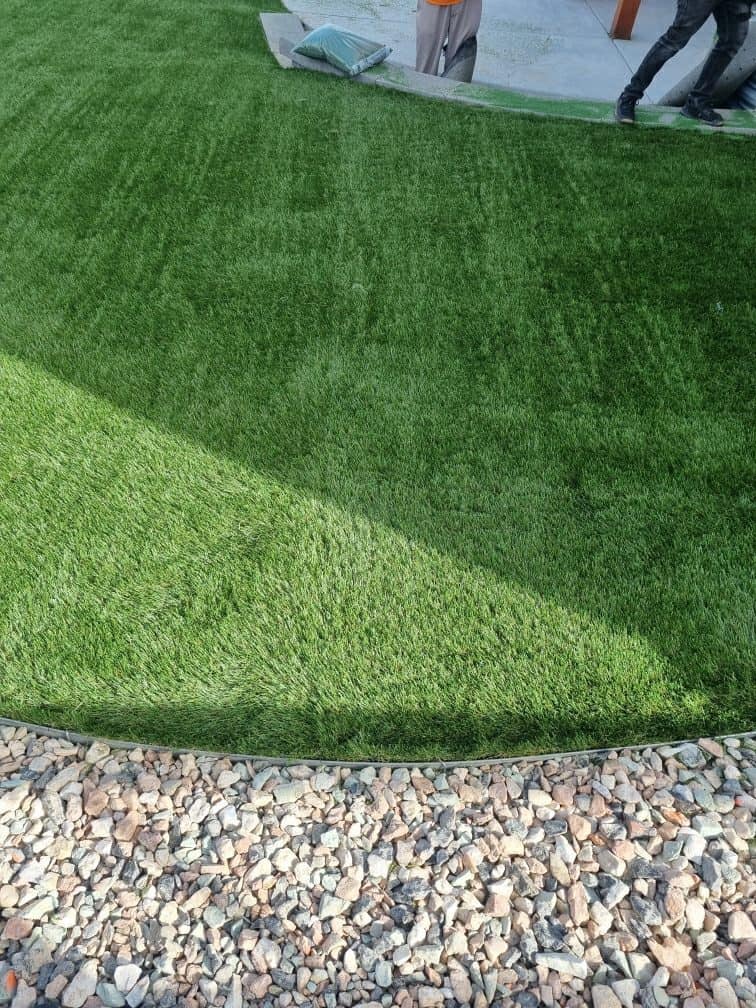 Artificial turf landscape design installed in a Colorado residential backyard