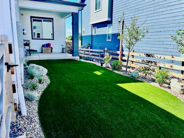 Artificial turf backyard installation by FRSR in the Colorado Front Range