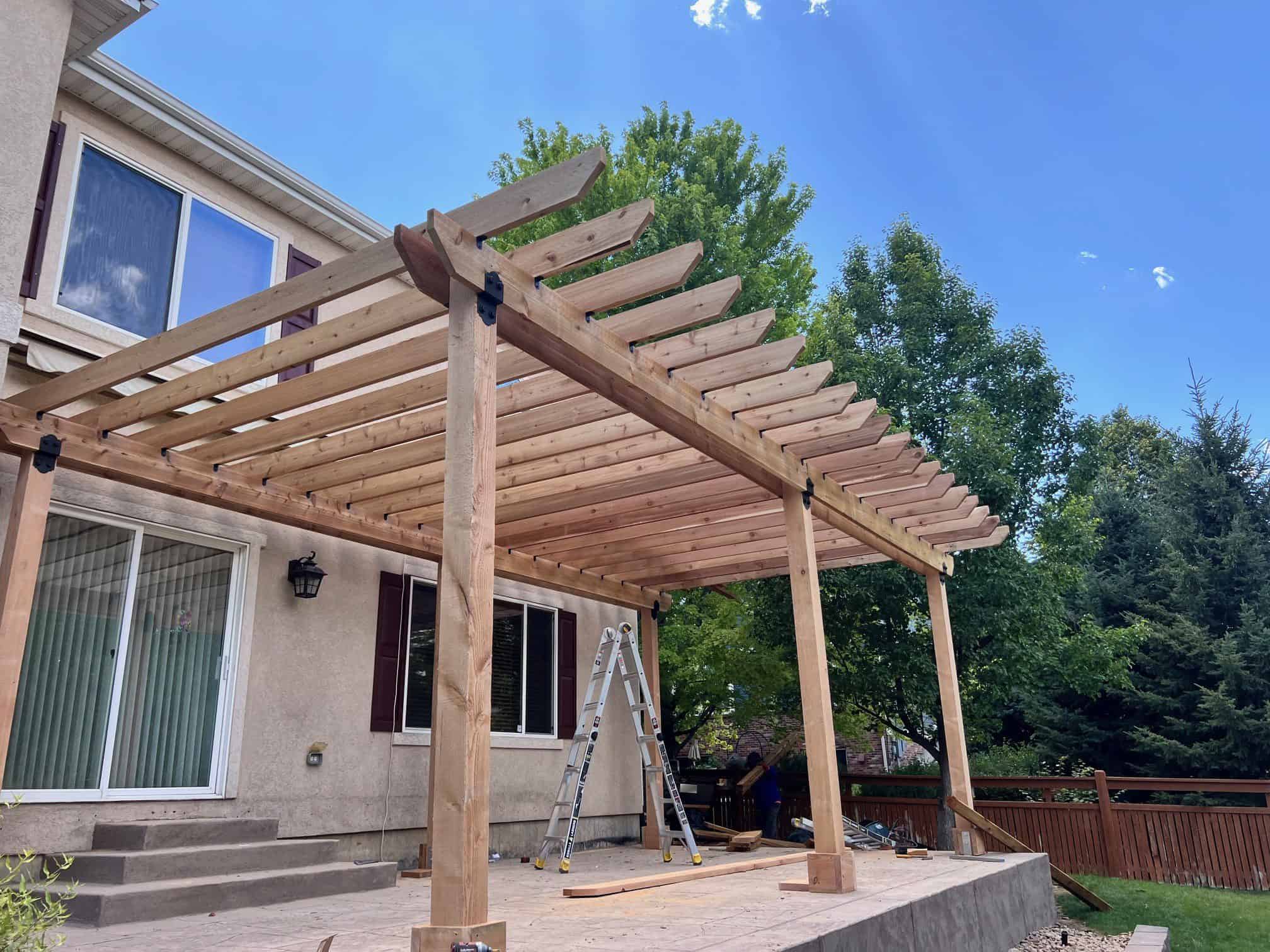 FRSR outdoor living structure integrated with patio, grading and landscaping in Colorado