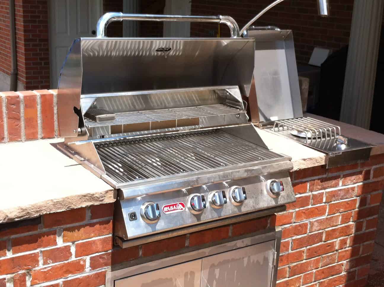 Geraghtie Project in Castle Rock Colorado stamped concrete patios firepit water feature and BBQ area by FRSR